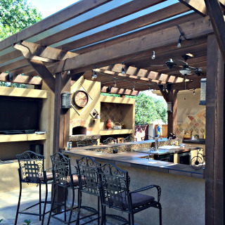 outdoor kitchen with pergola for gilday construction in manchester tn